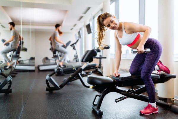 fit-woman-working-out-in-gym.jpg